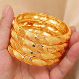 Set of 4 Elegant Golden-Tone Bangles - Stylish Open Cuff Design for Women💛